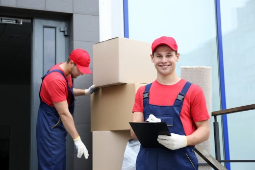 Careful handling of household items during a van move in Haringey