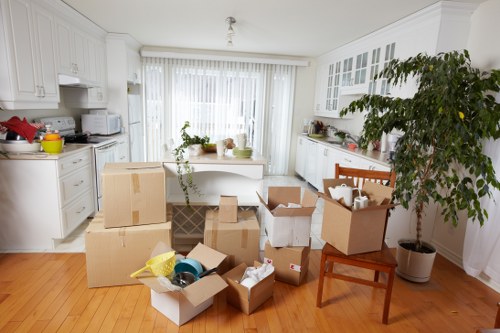 Packed office equipment ready for a commercial move in Haringey