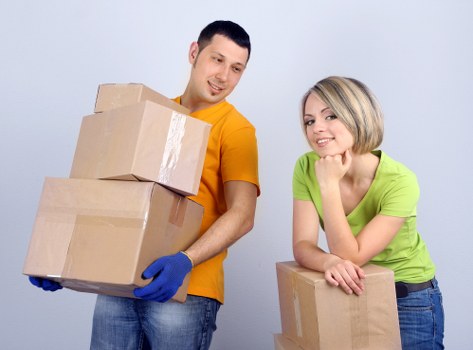 Packed boxes and furniture prepared for a local apartment relocation