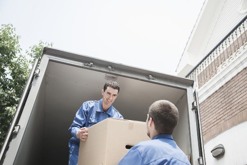 Moving team loading office items in a Haringey street